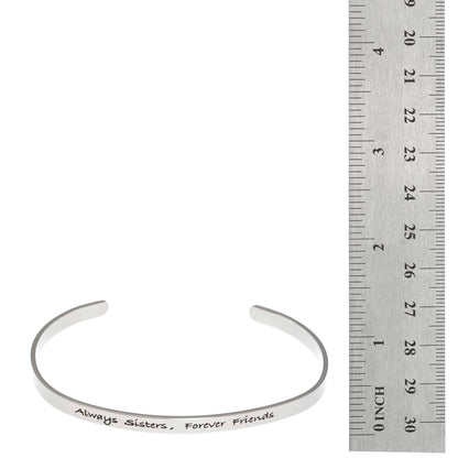 Stainless steel cuff bracelet with engraved words 'Always sisters, forever friends'—a heartfelt symbol of sisterhood and everlasting love