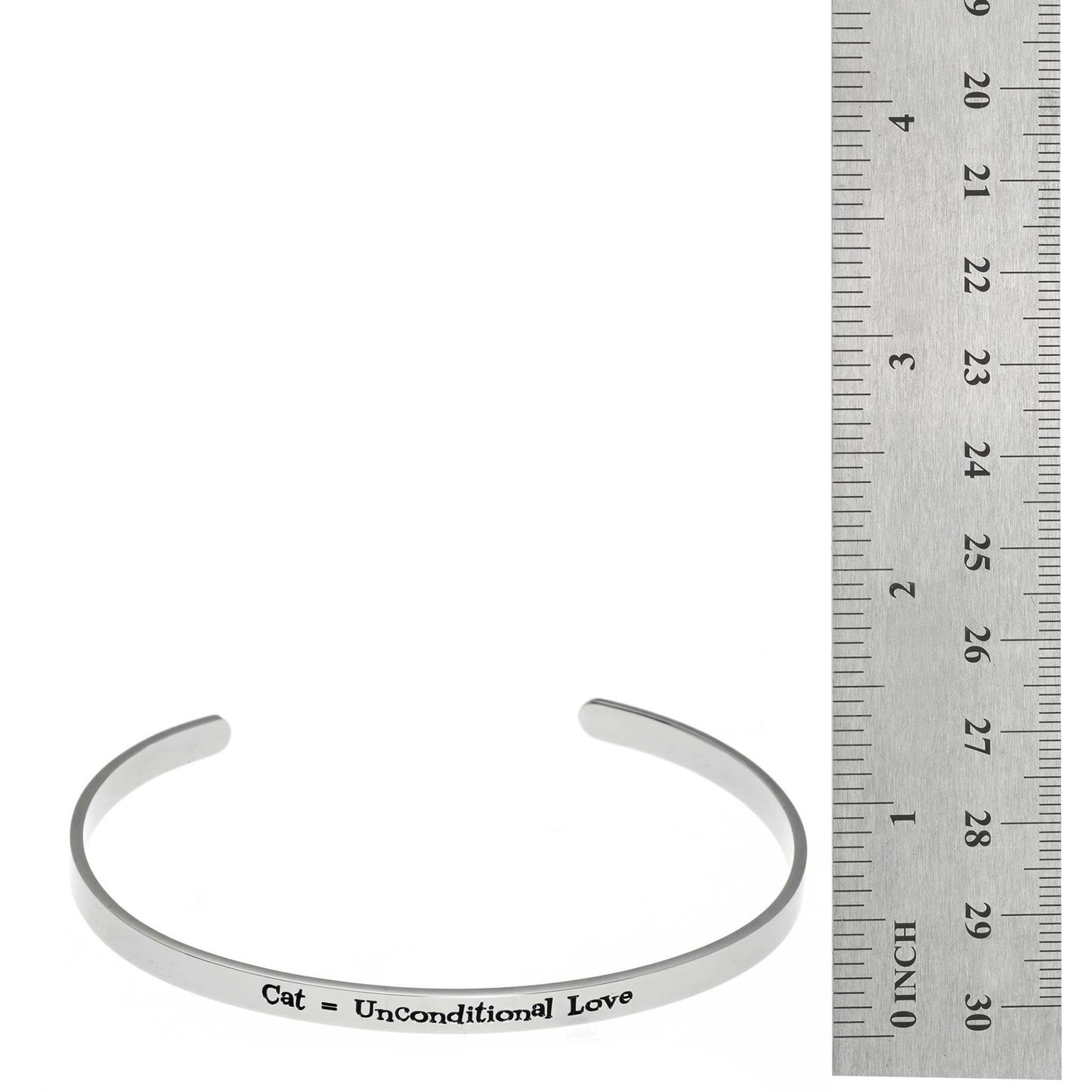 Stainless steel cuff bracelet with the inscription 'Cat, Unconditional Love' surrounded by paw prints.