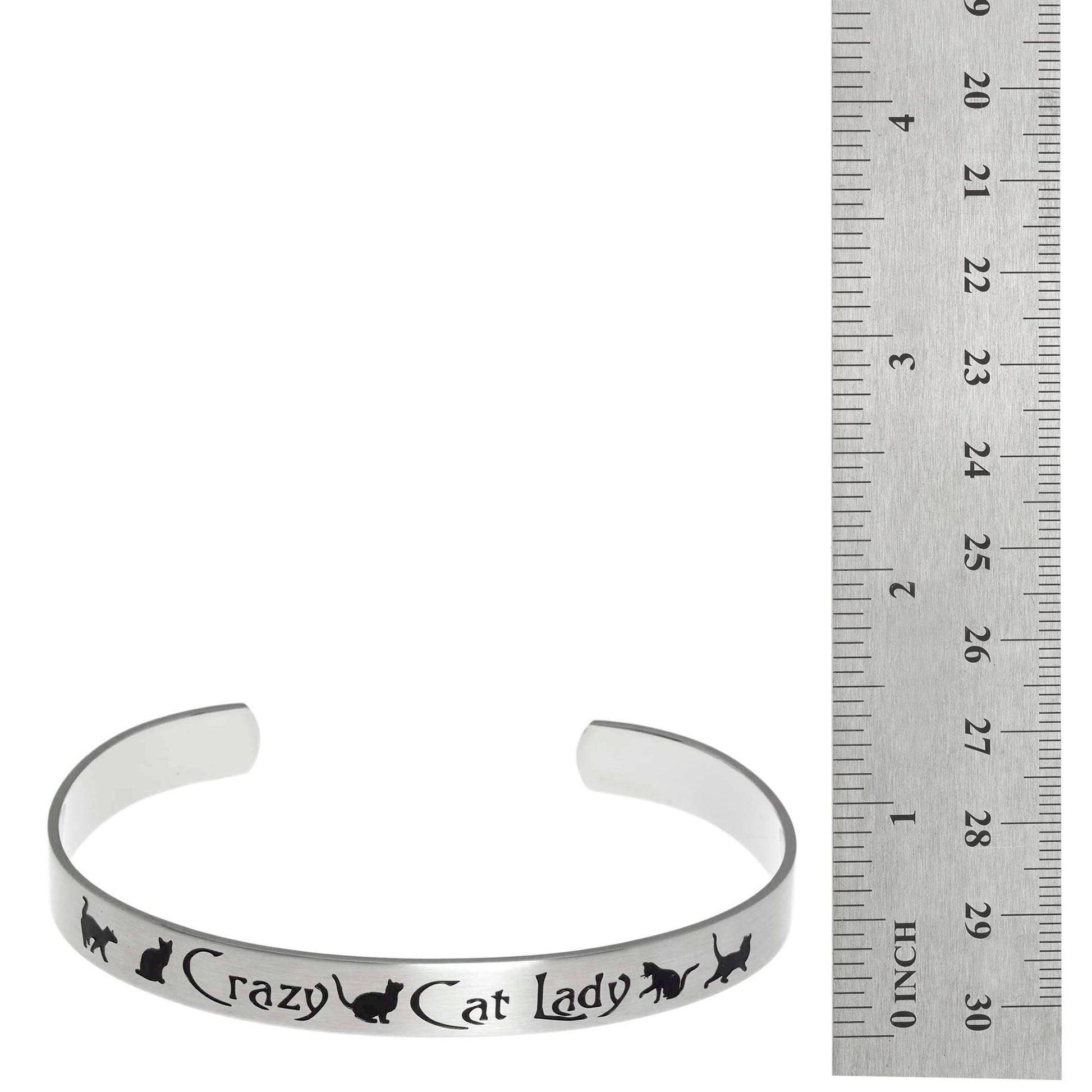 Stainless steel cuff bracelet with minimalistic silhouette of playful cats, featuring the text 'Crazy Cat Lady' surrounded by paw prints.