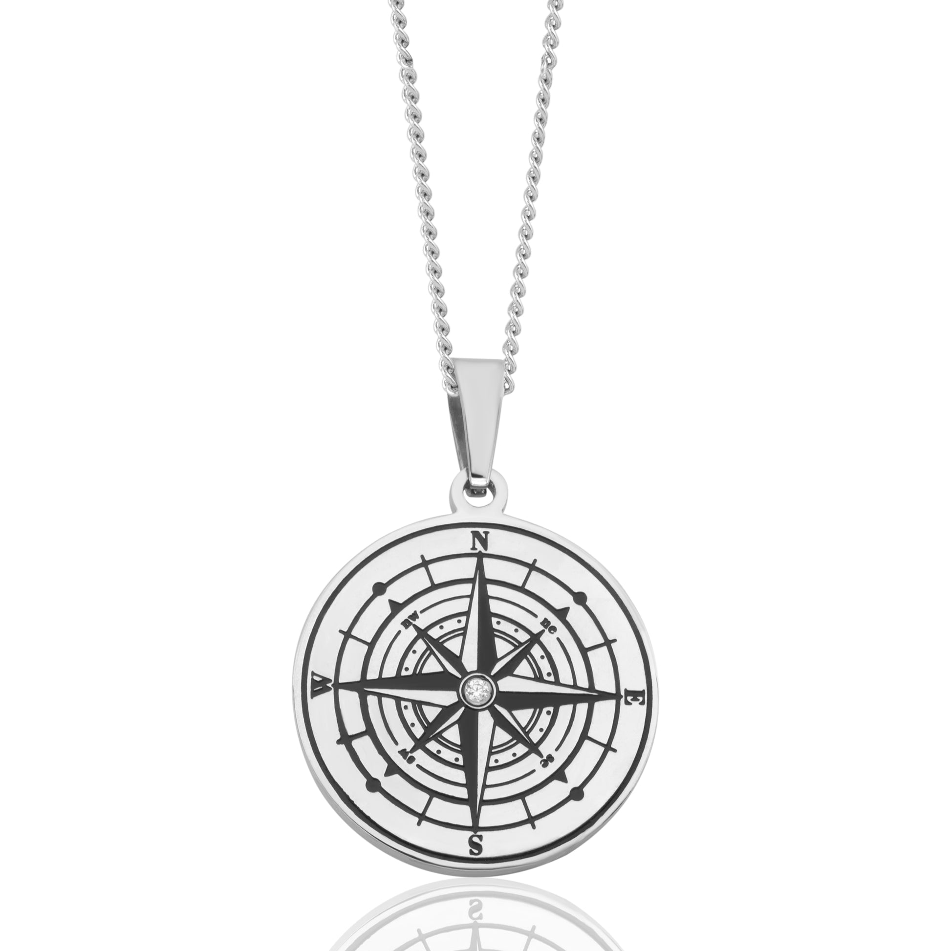 Nautical Compass CZ Pendant Necklace. The Compass Pendant features an engraving of a compass on the front of the pendant that is set in a center clear Cubic Zirconia stone. Since ancient times the compass has pointed travelers in the right direction. Known as a symbol of guidance and protection, it has always helped explorers find their way home. This pendant comes with an 18 inches chain with a 3 inches extender and a Lobster Claw clasp. The pendant material is Stainless Steel with a 1.25 inches length.