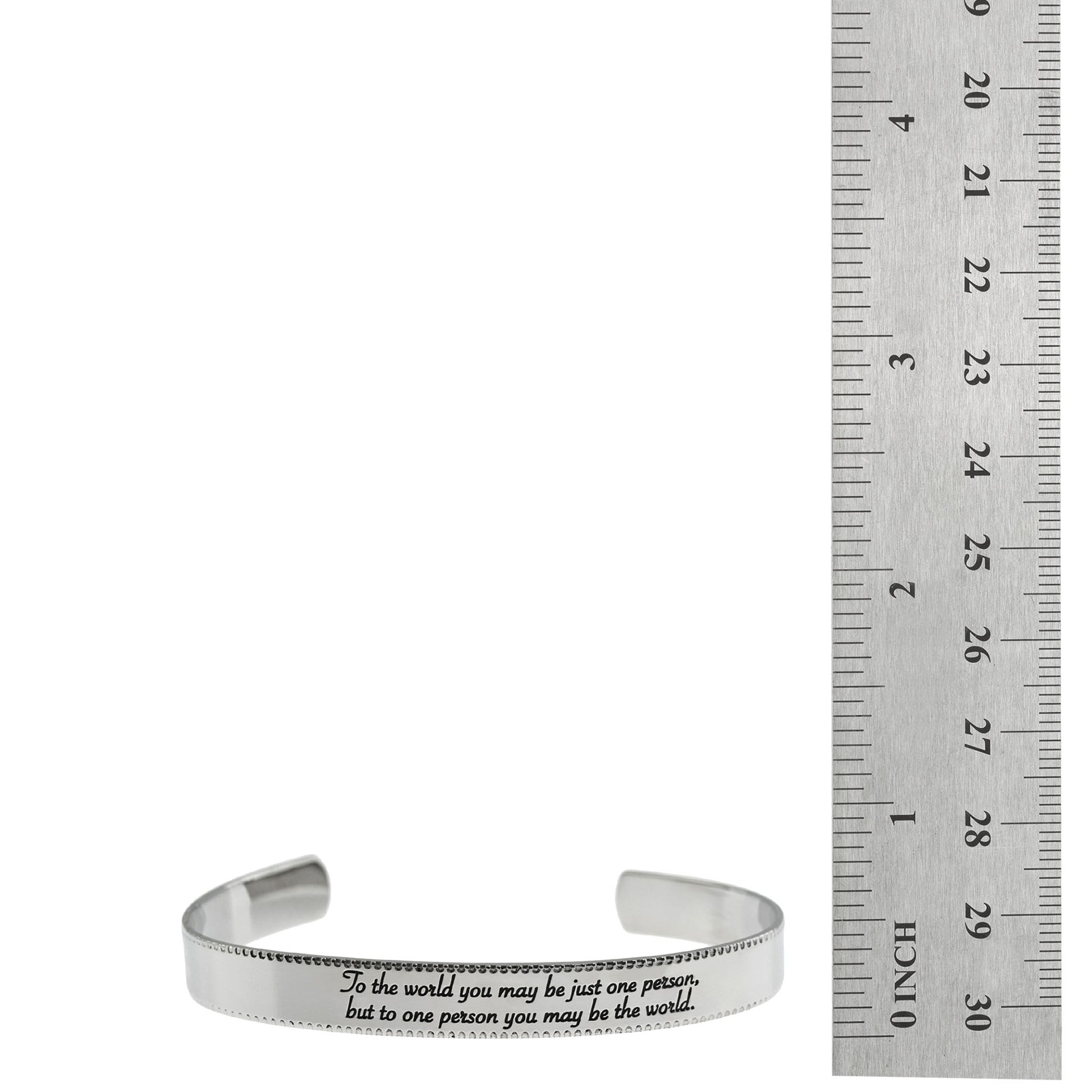 Stainless steel cuff bracelet with engraved words 'To the world you may be just one person, but to one person you may be the world'—a symbol of love and significance. Adjustable and crafted with high-quality materials.