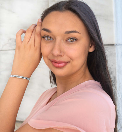 Stainless steel cuff bracelet with engraved words 'I love you to the moon and back'—a symbol of infinite love and cherished connections. Adjustable and crafted with high-quality materials